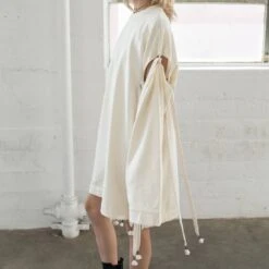 Puma X Fenty By Rihanna Women Staggered Hem Sweater Dress (white / Vanilla Ice) 9 Puma X Fenty By Rihanna Women Staggered Hem Sweater Dress (white / Vanilla Ice) -Tees Shop fenty web 2400